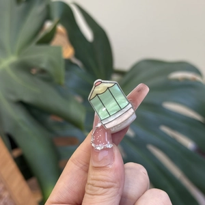 3D acrylic pencil nail charms on pink translucent press-on nails for Y2K manicure styling