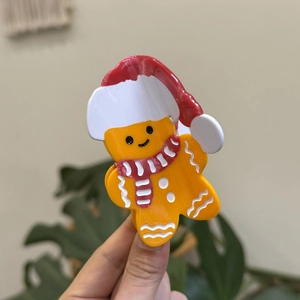 Pince à cheveux motif bonhomme de pain d'épices en acétate poli pour les fêtes
