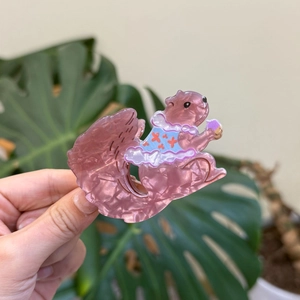 Cute squirrel shaped acrylic hair claw in purple marble finish with blue floral dress detail