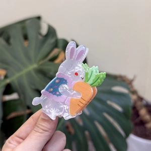 Acrylic bunny hair claw clip featuring a cute rabbit holding a carrot with floral vest
