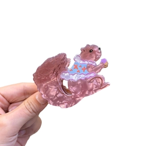 Cute pink and purple acetate squirrel hair claw clip with blue dress pattern for women