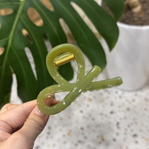Elegant translucent green pumpkin bow hair claw clip for women stylish hair styling