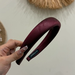 Burgundy satin padded headband for women with handmade label for elevated hairstyle look