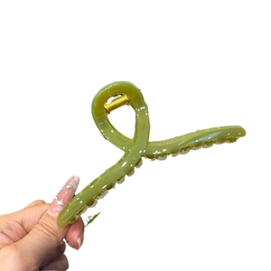 Elegant green acrylic large hair claw clip with cross design and gold metal spring