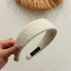Creamy beige plush felt headband for women with soft faux fur texture for autumn winter
