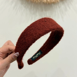 Deep red thick fleece headband with plush textured wool for a warm winter fashion style