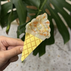 Cute ice cream cone shaped acetate hair claw clip with cream stone pattern and gold details