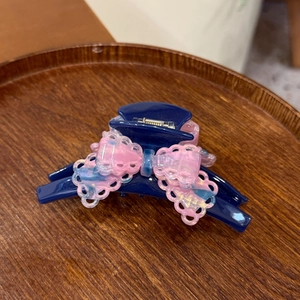 Elegant navy blue hair claw clip with gradient lace bow and polished finish