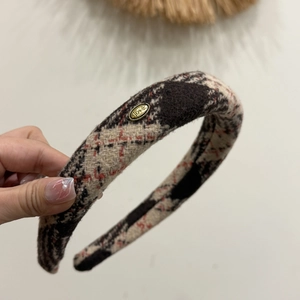 Padded vintage plaid headband in brown wool fabric with gold 'love' metal tag