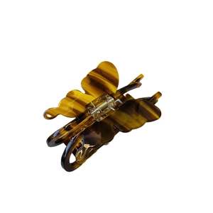 Elegant tortoiseshell butterfly hair claw clip with acetate finish and metal spring