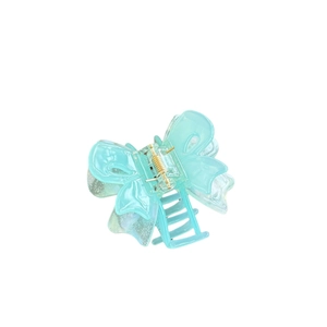 Blue butterfly hair claw clip in acetate with glitter wings and gold metal spring