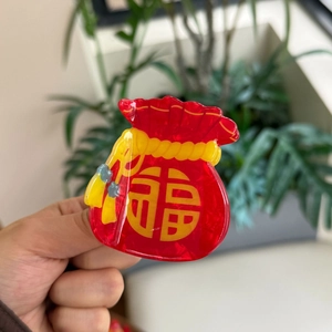 Acrylic red lucky bag hair claw clip with golden Fu character for New Year style