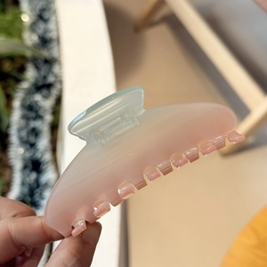 Elegant gradient blue to pink acetate hair claw clip with large translucent seven-teeth design