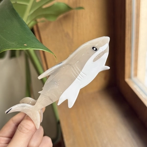 Elegant shark-shaped acetate hair claw clip with marble grey and white textures