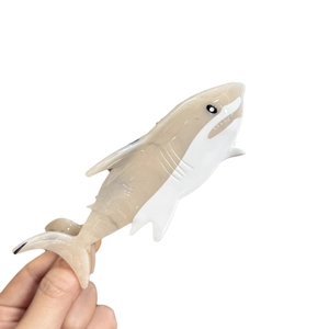 Elegant shark-shaped acetate hair claw clip with beige marble and white color-block design