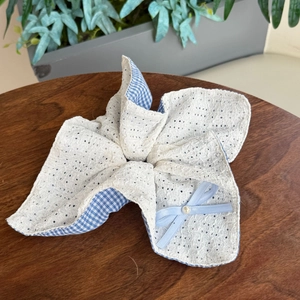French blue gingham hair scrunchie with white eyelet embroidery and faux pearl detail