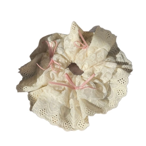 Lace polka dot scrunchie with pink ribbons for a sweet pastoral hair accessory style