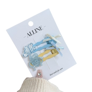 Lot de barrettes douces avec papillon bleu et cœur jaune ornées de rubans de soie