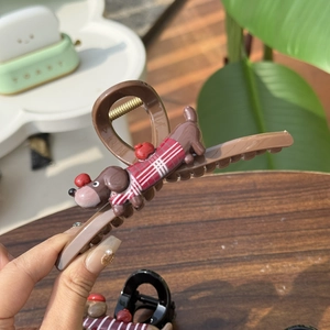 Cute brown dachshund claw clip with red and white checkered sweater doll accessory