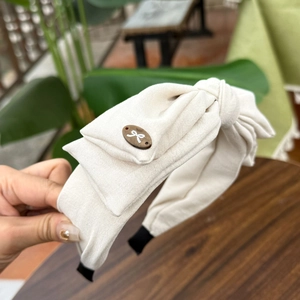 Serre-tête à pois blanc crème avec nœud élégant en lin et bouton décoratif pour femme