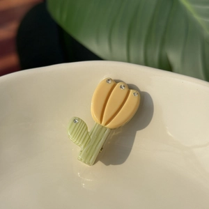 French tulip hair clip in yellow and green acetate with sparkling crystals