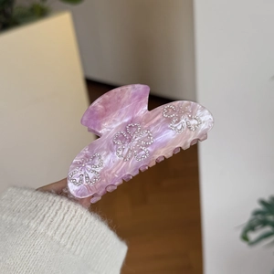 Pink marble acetate heart hair claw with rhinestones for elegant styling