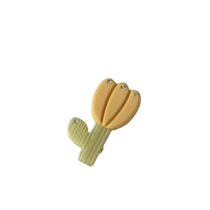 French tulip hair clip with rhinestones and yellow petals on a clean white background