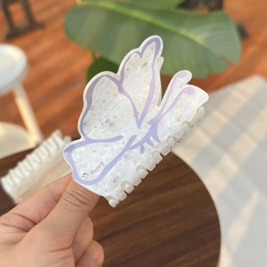 Elegant pearl white acrylic butterfly hair claw clip with floral print and rhinestone detail