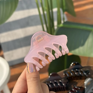 Elegant 6cm light pink acrylic hair claw clip for women with a gold metal spring