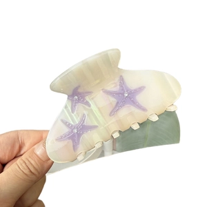 Pinza de pelo de estrella de mar translúcida con diamantes morados para mujer