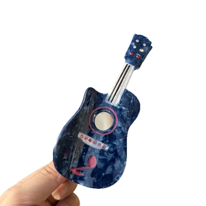 Guitar shaped blue marble acetate hair claw clip with pink musical notes and rhinestones