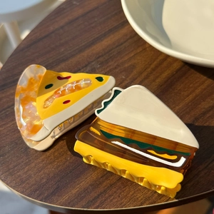 Creative food-shaped hair claw clips featuring pizza and sandwich designs made of acetate