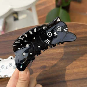 Handheld black cat acetate hair claw clip with rhinestones and white cat patterns