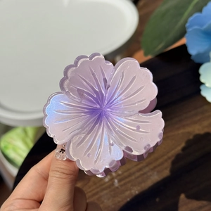 Pearlescent gradient flower hair claw clip in purple and blue resin for women