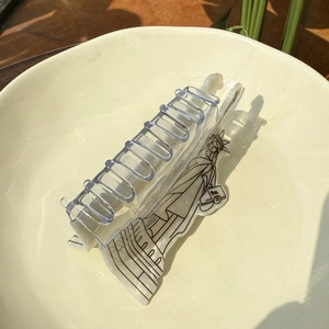 Elegant cellulose acetate hair claw clip with Statue of Liberty art in pearl white finish