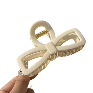 Pince à cheveux nœud crème de 10 cm avec un ressort métallique doré robuste