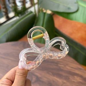 Elegant 8cm transparent heart bow hair claw clip for women with gold metal spring