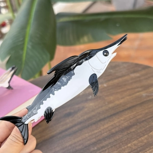Unique swordfish shaped acetate hair claw clip with black and white two-tone sleek finish
