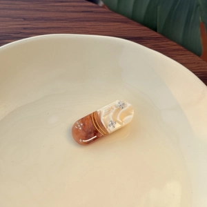 Vintage capsule acetate hair clip with marble pattern and sparkling rhinestones