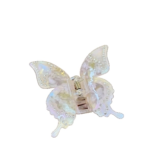 Elegant butterfly hair claw clip with colorful marble texture and sparkling rhinestones