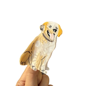 Golden Retriever dog-shaped acetate hair claw clip with cream and brown patterns