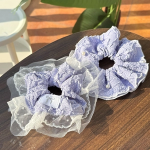 Lavender purple lace bow and pearl scrunchie hair ties for elegant styling and vacation look