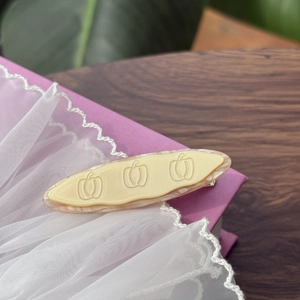 Florale ovale Haarspange mit Kürbismuster und marmoriertem Harzfinish für Damen
