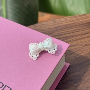 Pale green acetate lace bow hair clip for women with delicate hollow-out floral pattern