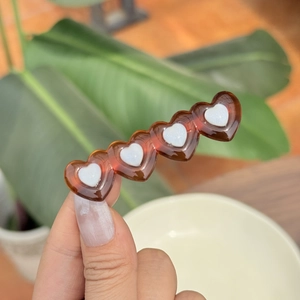 Sweet double-layer heart-shaped acetate hair clip with glitter floral accents for women