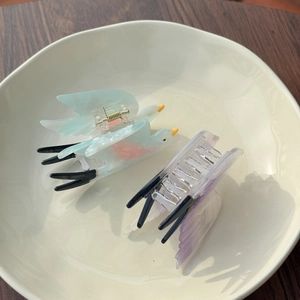 Chic acetate swallow bird hair claws in blue and purple, stylish hair clips for women