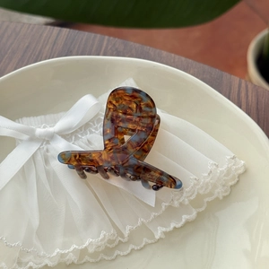 French tortoise shell acetate hair claw clip with vintage amber and blue patterns