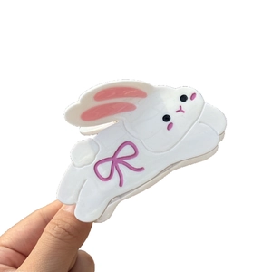 Cute white cartoon bunny hair claw clip with pink bow made of premium acetate material