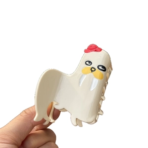 Pince à cheveux phoque mignonne en acétate blanc crème avec chapeau rouge et barbe jaune