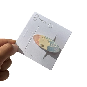 Acetic acid hair clip with pearl and profile design on brand display card